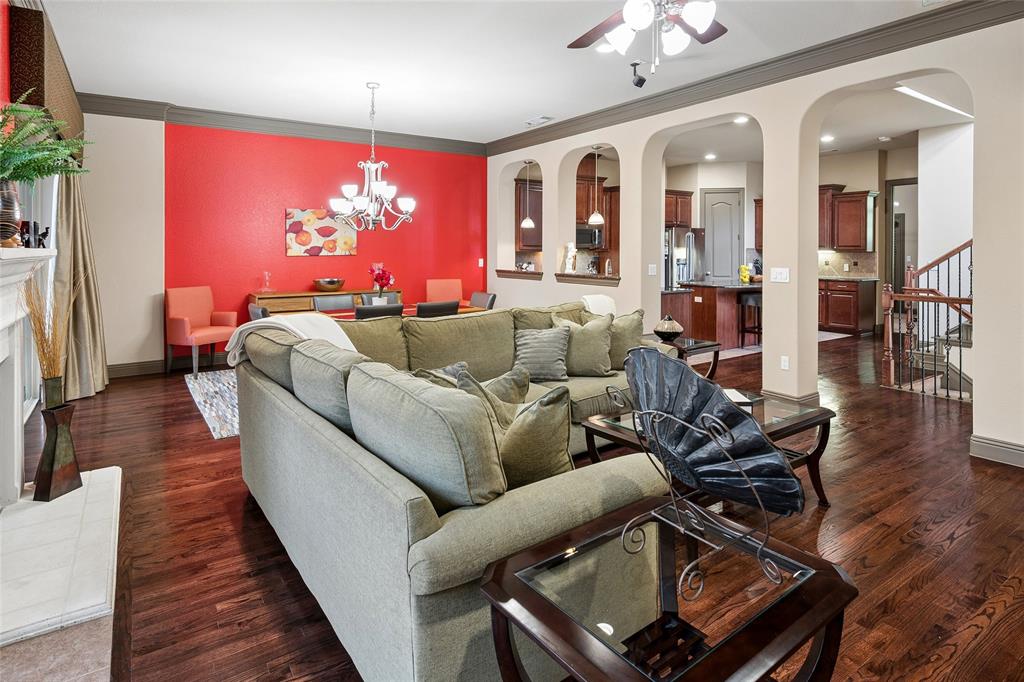 835 Rockingham Drive Irving, TX 75063 - Photo 8 of 27 a living room with furniture and wooden floor