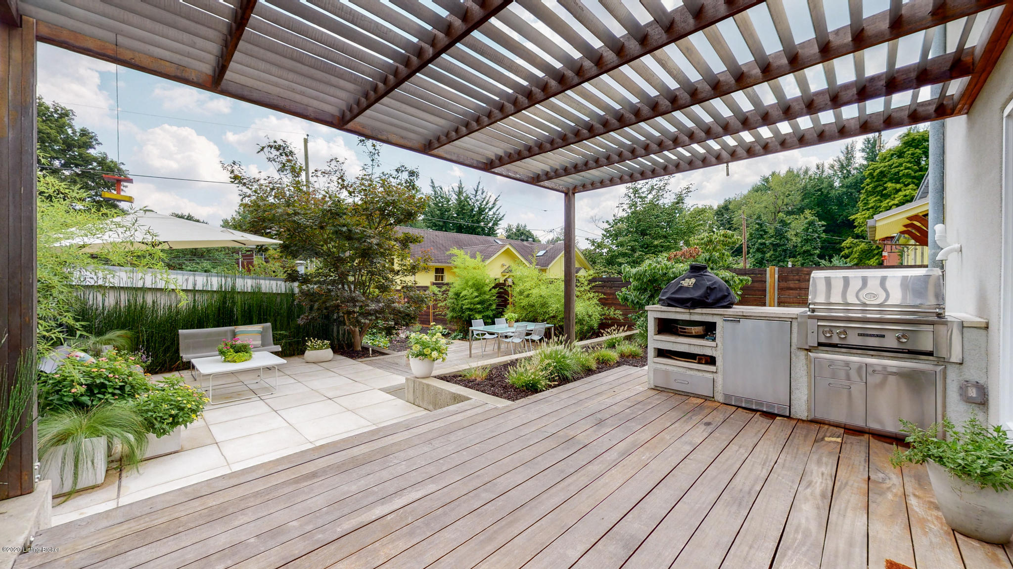 1444 Cherokee Road Louisville, KY 40204 - Photo 49 of 55 Steel pergola is well designed and this concrete cooking island was custom designed for its elements.