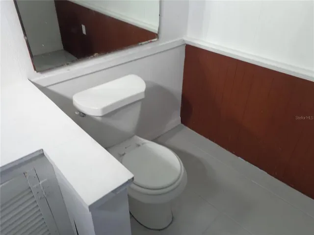 a bathroom with a toilet