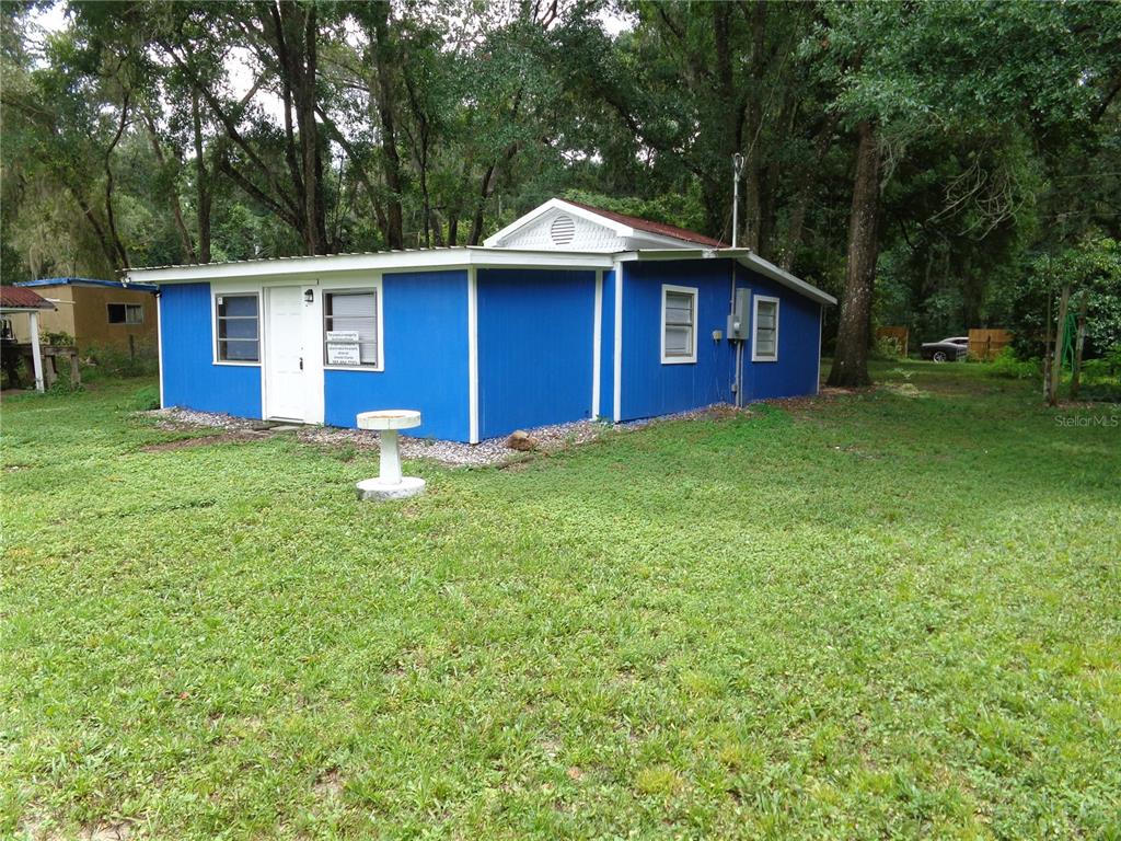 2878 Northeast 161st Street Citra, FL 32113 - Photo 3 of 38 a view of a house with a yard