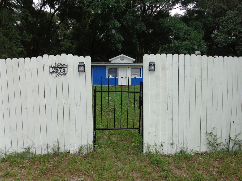 2878 Northeast 161st Street Citra, FL 32113 - Photo 34 of 38 a view of a wooden fence
