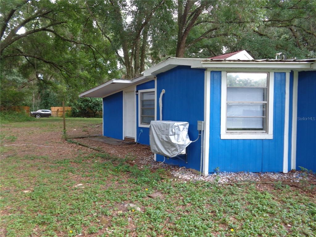 2878 Northeast 161st Street Citra, FL 32113 - Photo 4 of 38 a fire hydrant in the middle of a field
