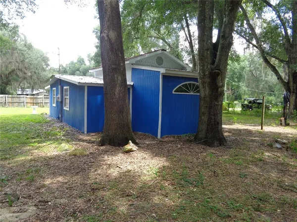 a view of outdoor space and yard