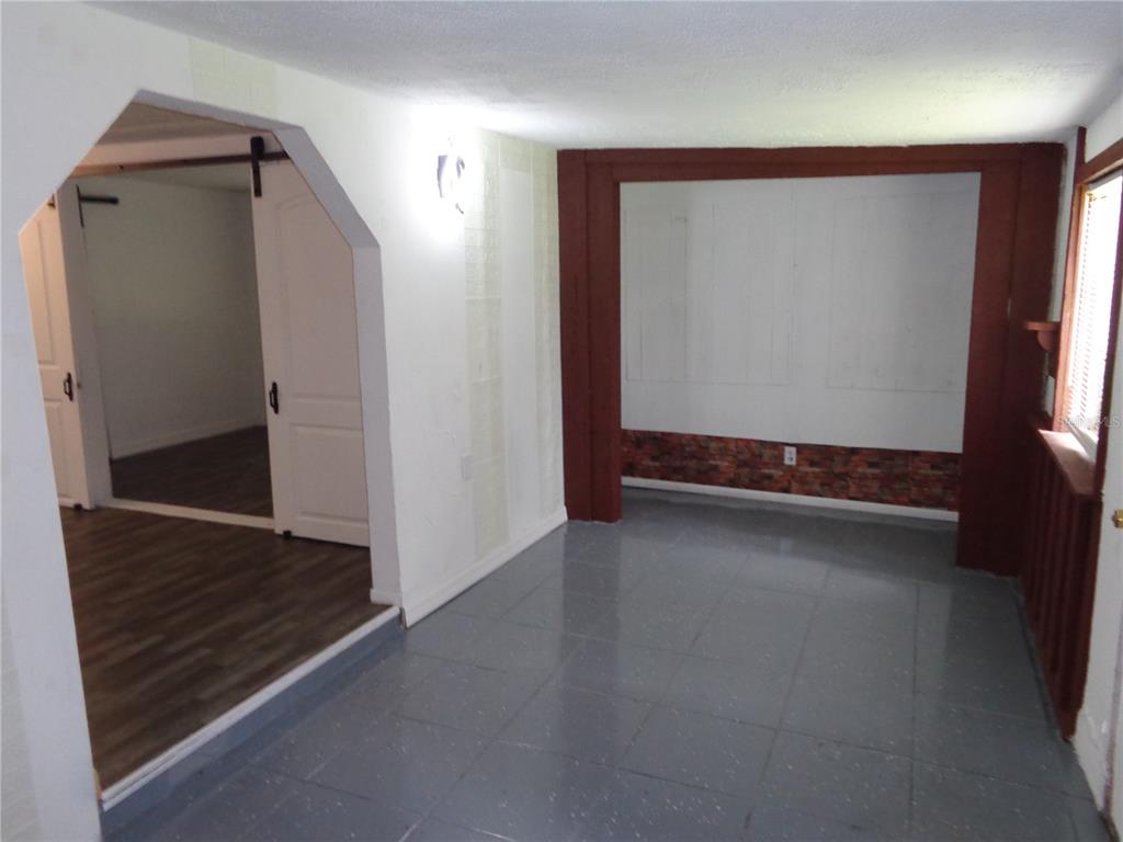 2878 Northeast 161st Street Citra, FL 32113 - Photo 8 of 38 a view of room with window and hardwood floor