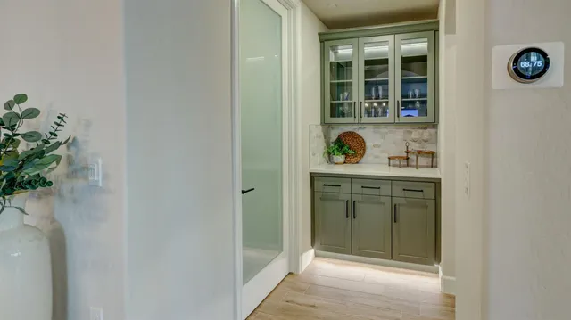 a bathroom with a sink and a window