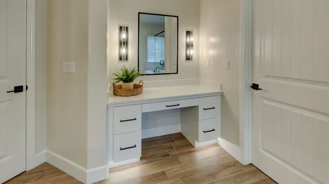 a bathroom with a sink and a mirror