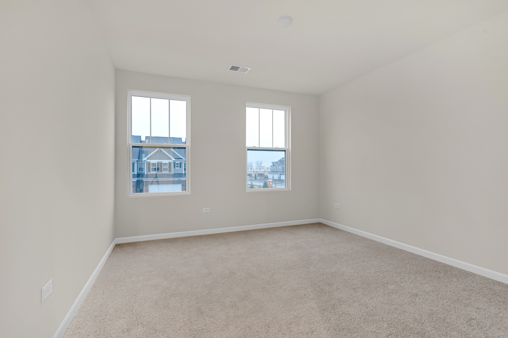 668 Switchgrass Way Bolingbrook, IL 60490 - Photo 16 of 21 an empty room with windows
