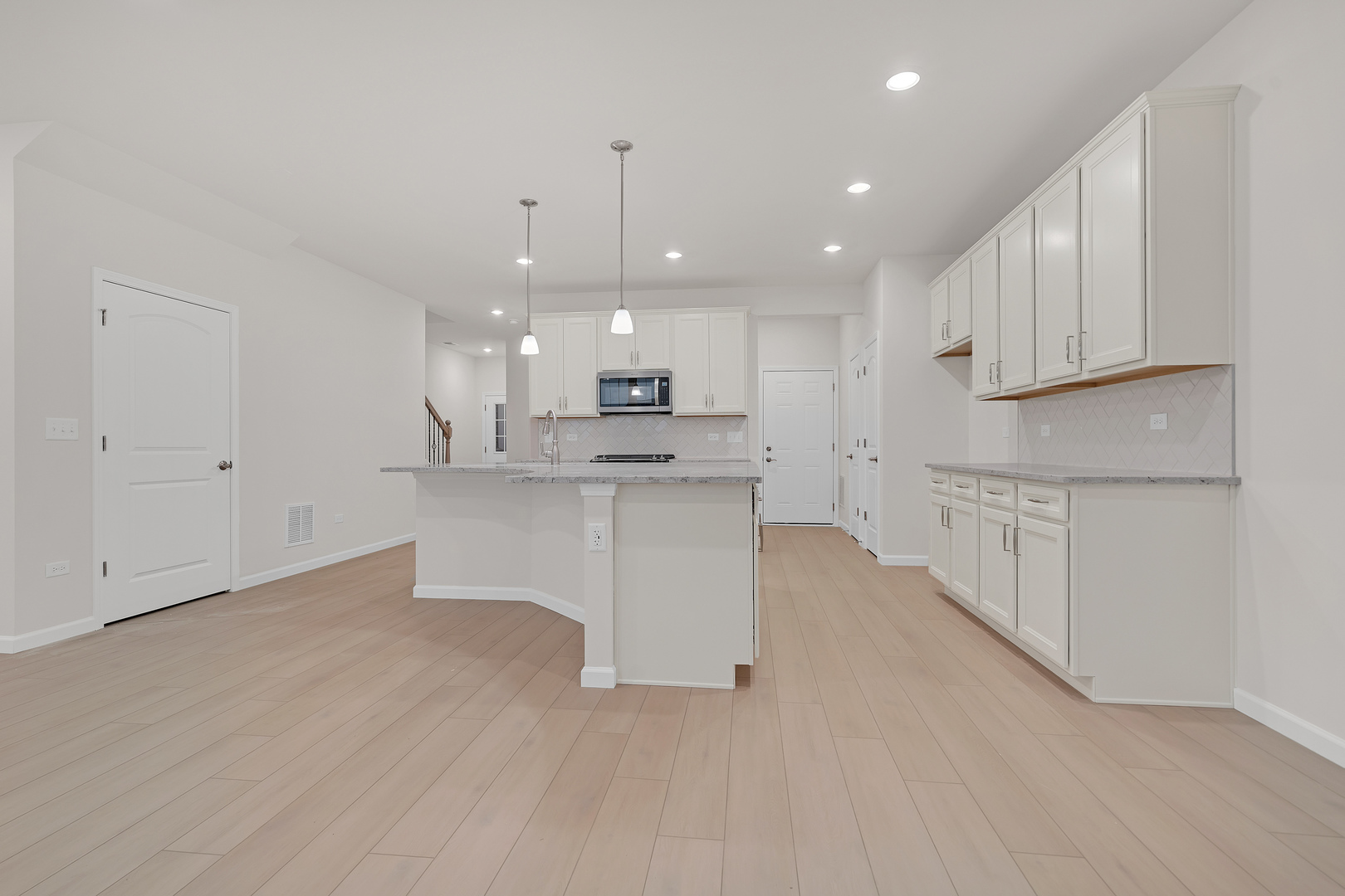 668 Switchgrass Way Bolingbrook, IL 60490 - Photo 6 of 21 a view of kitchen with wooden floor