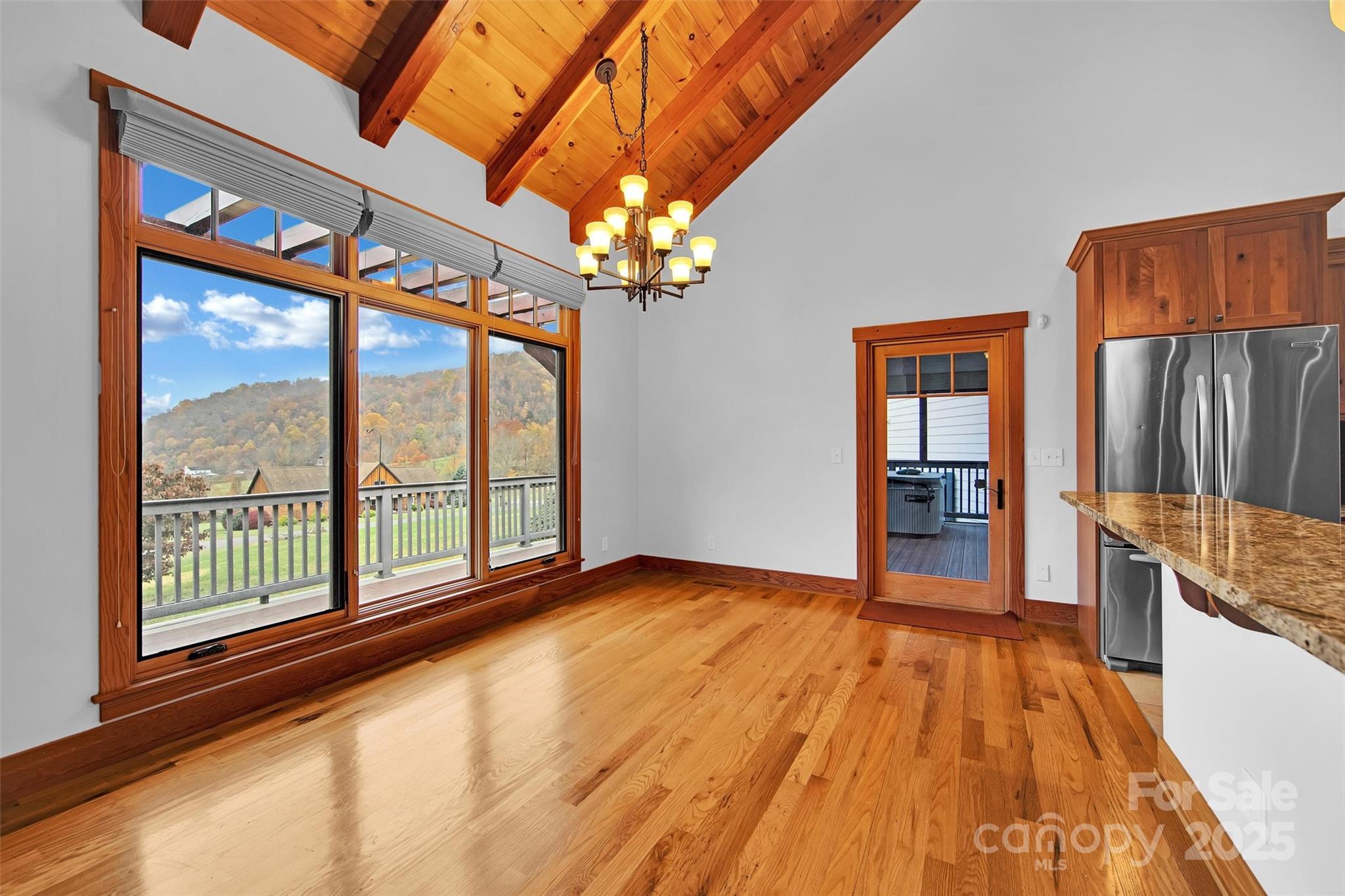 12 Rolling Meadow Lane Clyde, NC 28721 - Photo 13 of 44 a view of livingroom with kitchen and hardwood