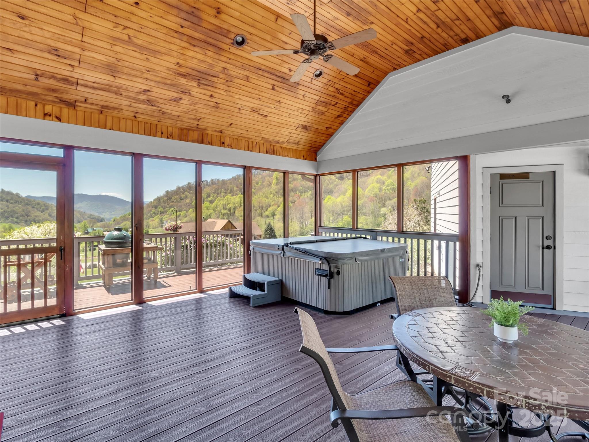12 Rolling Meadow Lane Clyde, NC 28721 - Photo 32 of 44 a dining room with wooden floor and furniture