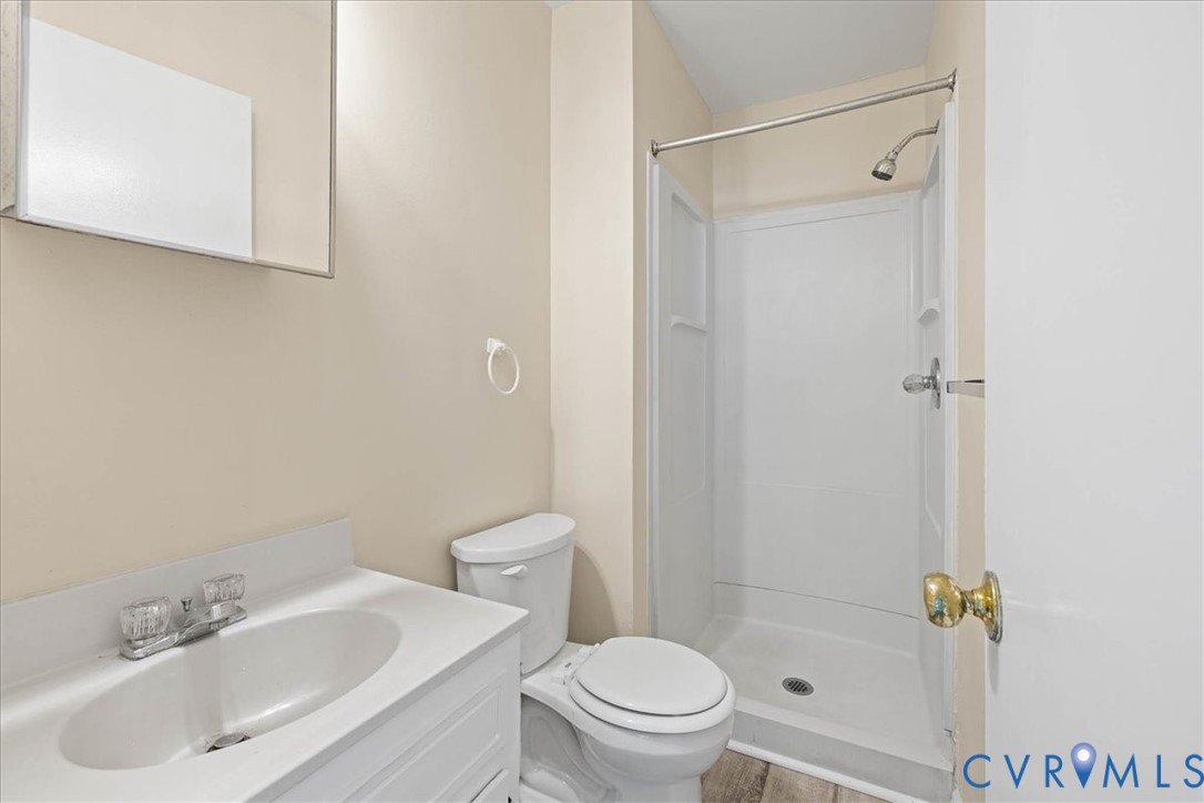 1618 Old Iron Road Hopewell, VA 23860 - Photo 13 of 25 Bathroom featuring a shower and vanity
