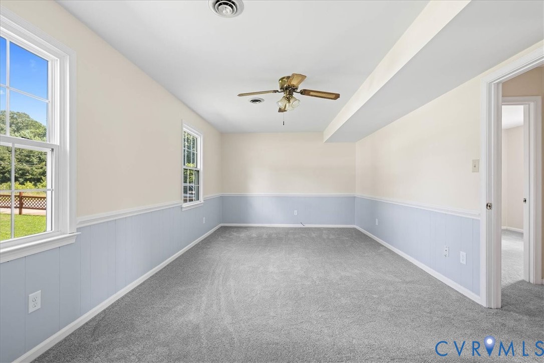 1618 Old Iron Road Hopewell, VA 23860 - Photo 16 of 25 Spare room featuring a wainscoted wall, a ceiling