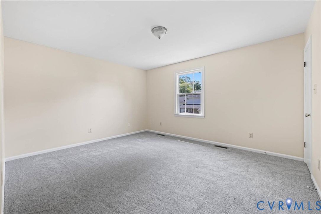 1618 Old Iron Road Hopewell, VA 23860 - Photo 22 of 25 Spare room featuring carpet floors