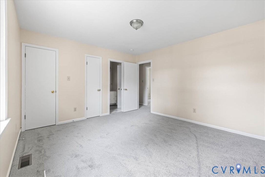 1618 Old Iron Road Hopewell, VA 23860 - Photo 23 of 25 Unfurnished bedroom with carpet flooring and baseb