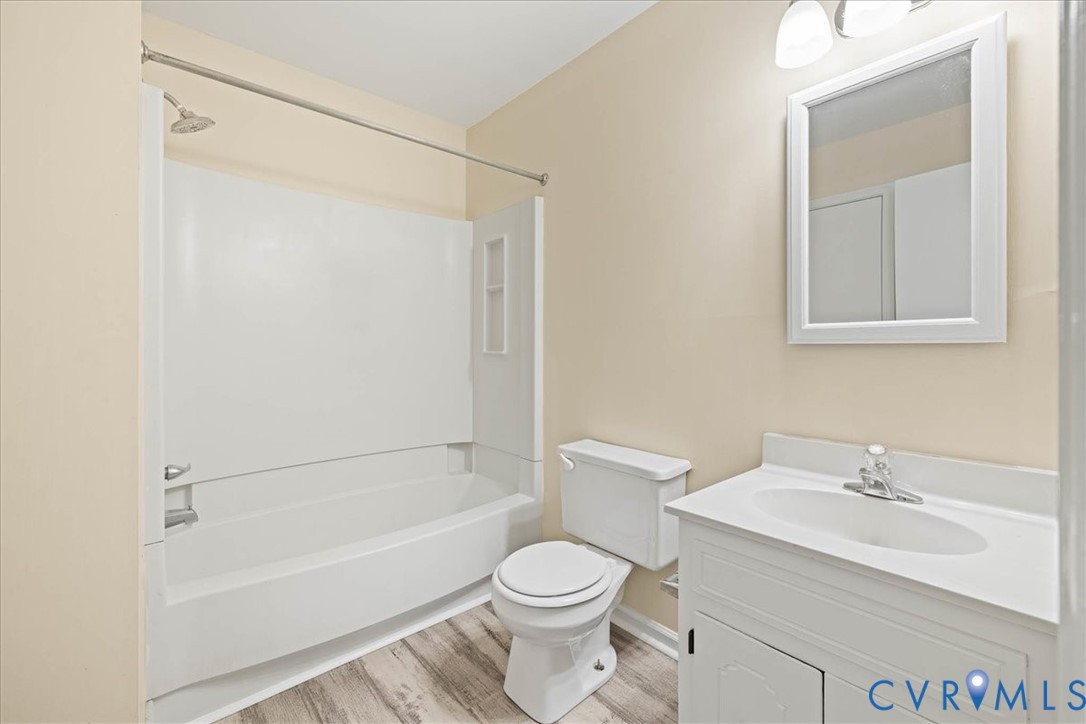 1618 Old Iron Road Hopewell, VA 23860 - Photo 24 of 25 Bathroom featuring vanity, wood finished floors, a