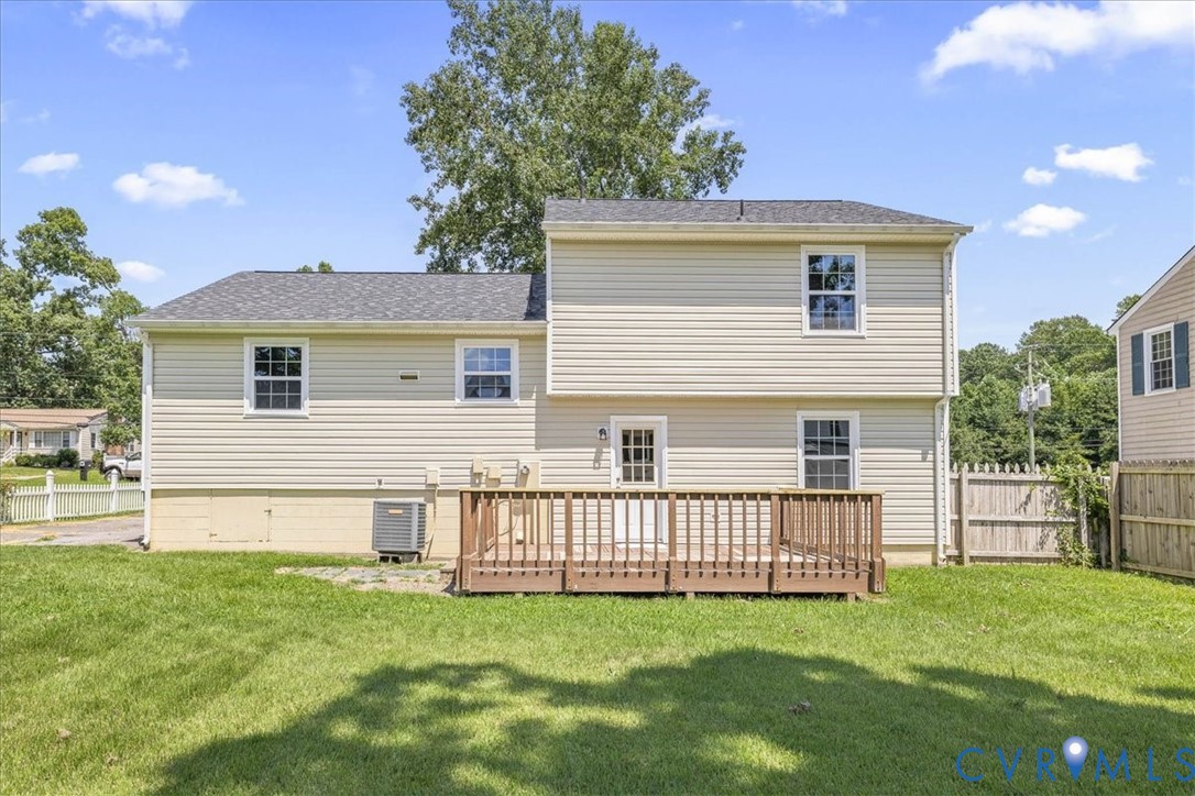 1618 Old Iron Road Hopewell, VA 23860 - Photo 25 of 25 Back of house with a wooden deck and roof with shi