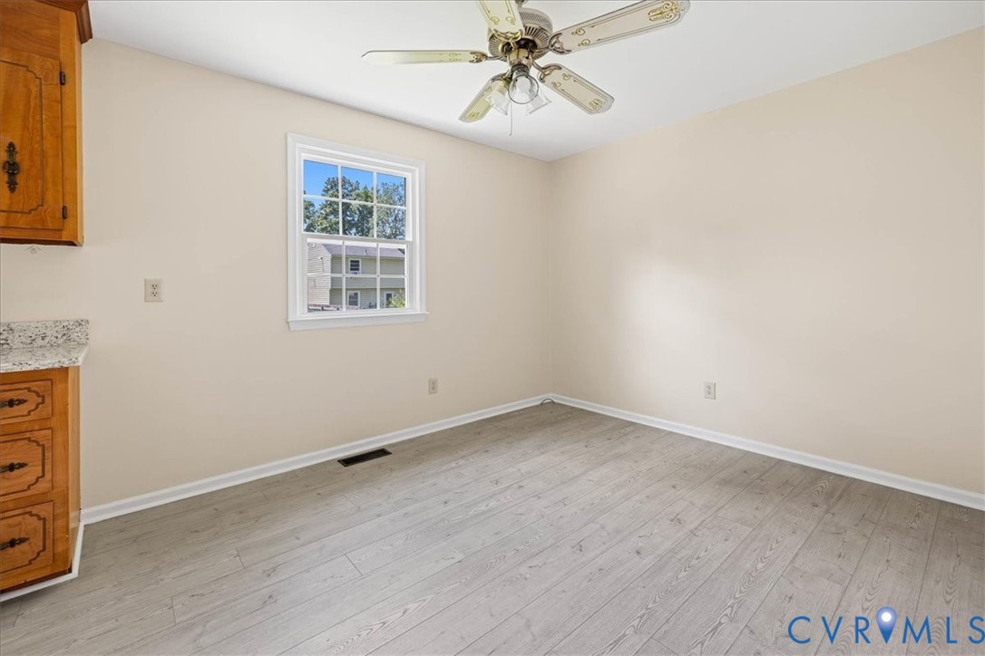 1618 Old Iron Road Hopewell, VA 23860 - Photo 10 of 25 Unfurnished room with light wood-style flooring an