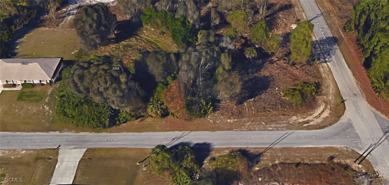 5202 2nd Street West Lehigh Acres, FL 33971 - Photo 5 of 6 a view of a yard