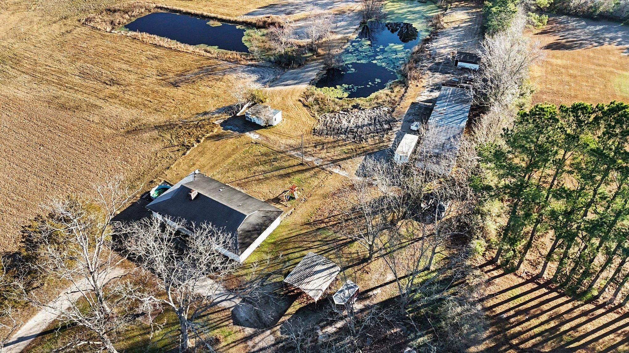1897 Heritage Road Loris, SC 29569 - Photo 31 of 32 Aerial view of property and surrounding area featuring rural landscape