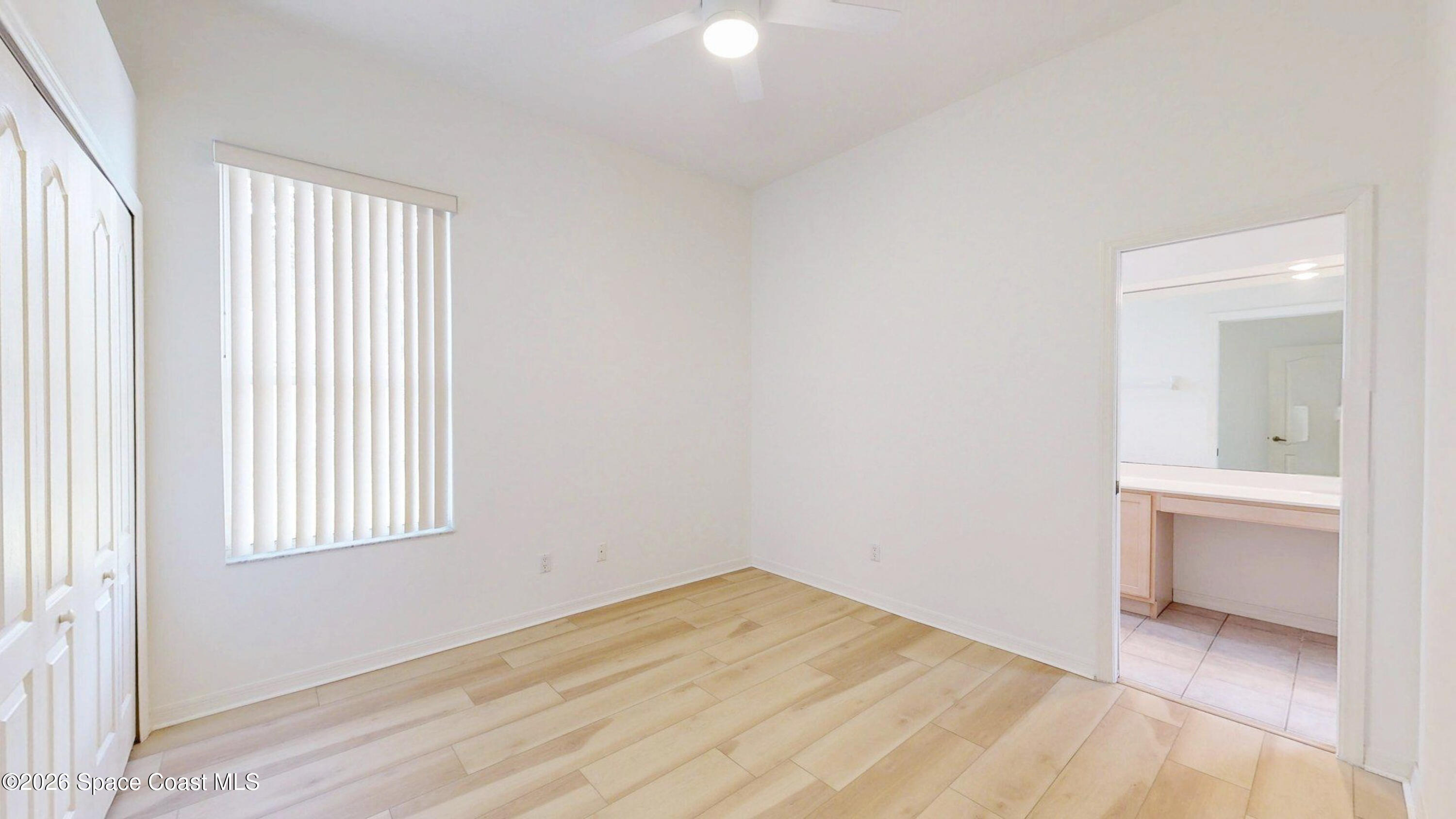 2703 Barrow Drive Merritt Island, FL 32952 - Photo 24 of 43 an empty room with a bathroom and a window