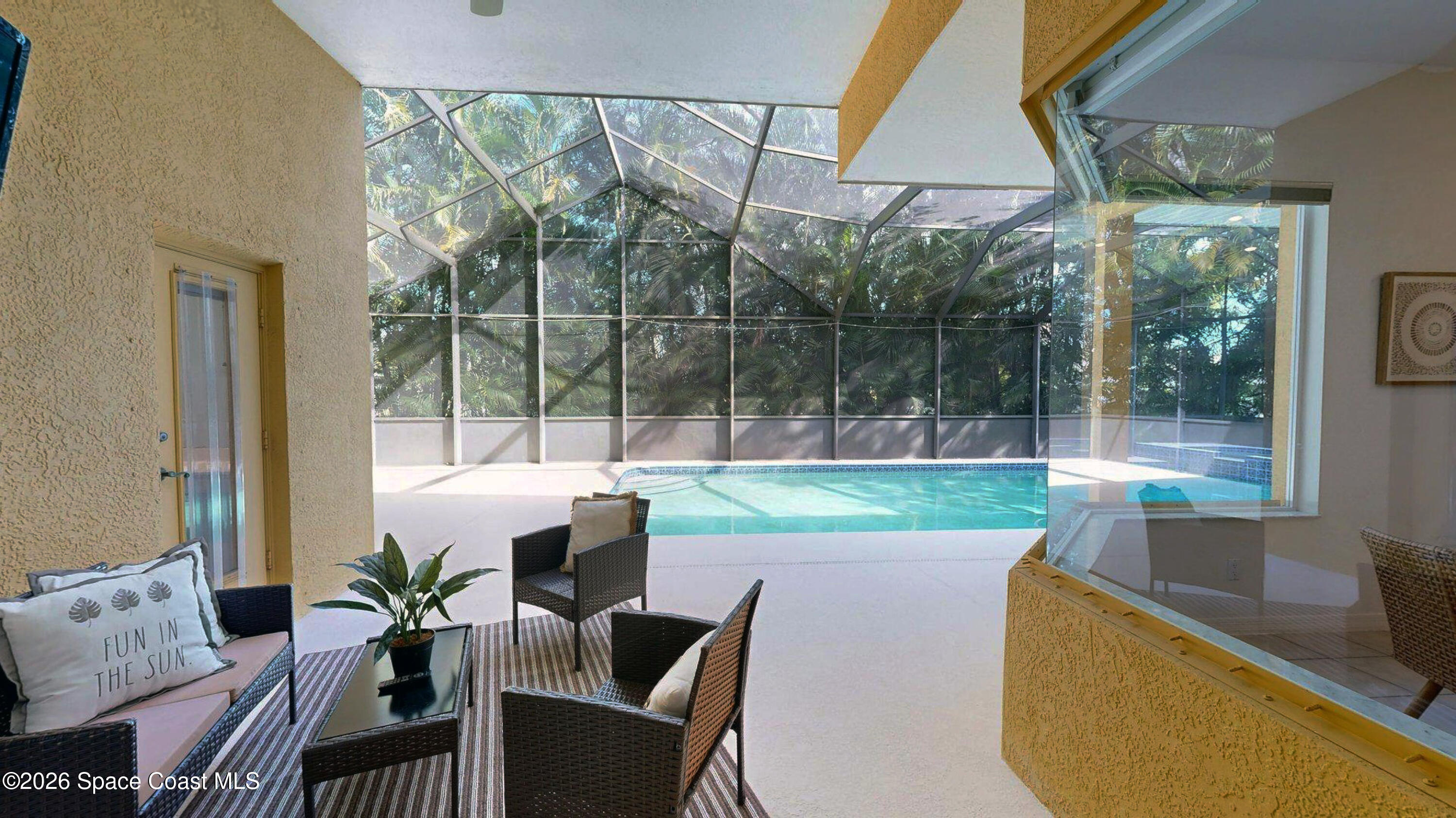 2703 Barrow Drive Merritt Island, FL 32952 - Photo 36 of 43 a patio view with a seating space and a ocean view