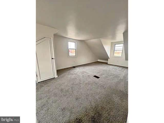 a view of a livingroom with a staircase