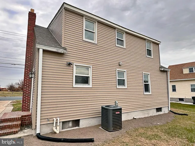 a front view of a house with a garage