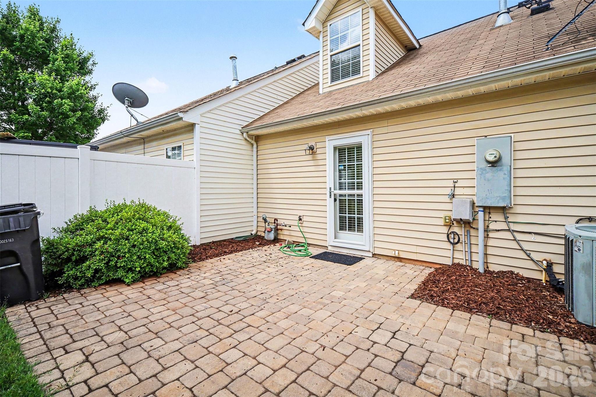 1210 Sheldon Brook Lane Fort Mill, SC 29707 - Photo 23 of 26 a backyard of a house with lots of green space