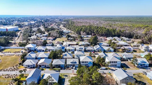 an aerial view of a city with lots of residential buildings