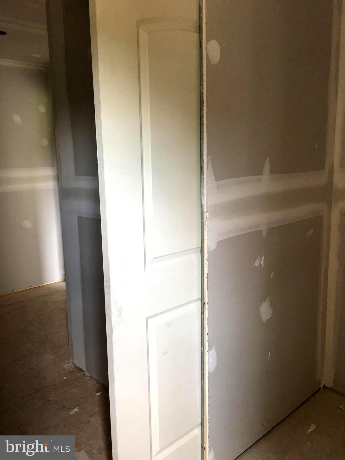 10243 Eggbornsville Road Rixeyville, VA 22737 - Photo 7 of 20 Pocket door between MBR closet & Laundry room