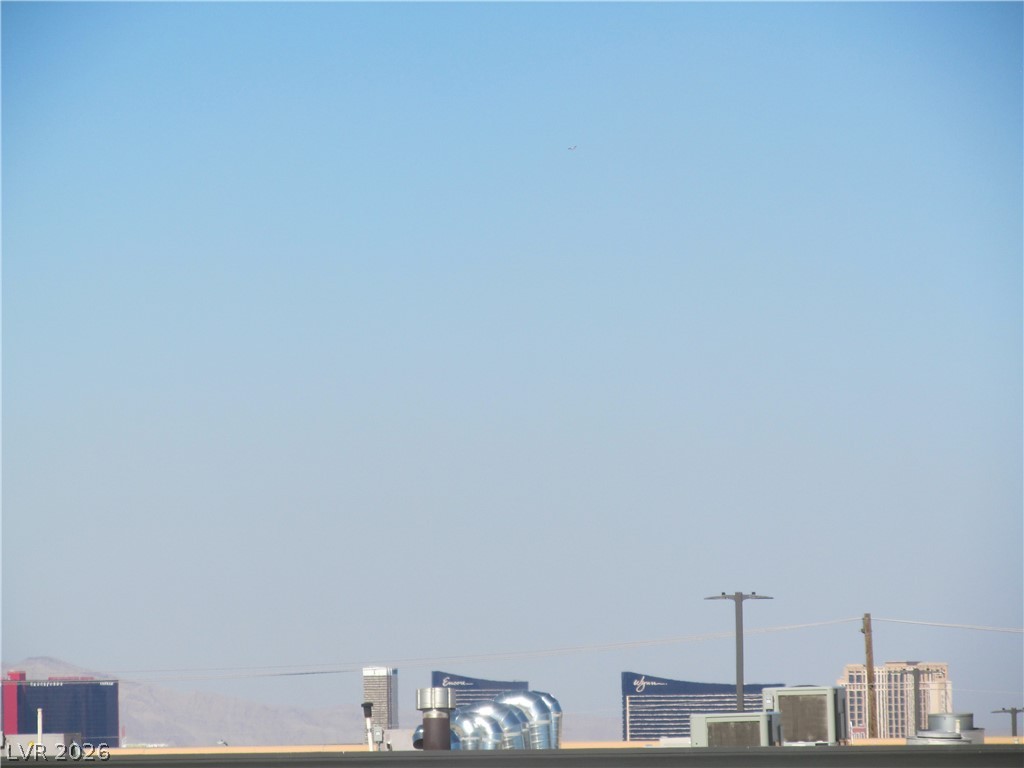 7950 West Flamingo Road, Unit 2048 Las Vegas, NV 89147 - Photo 14 of 24 City skyline with distant structures and open desert views.