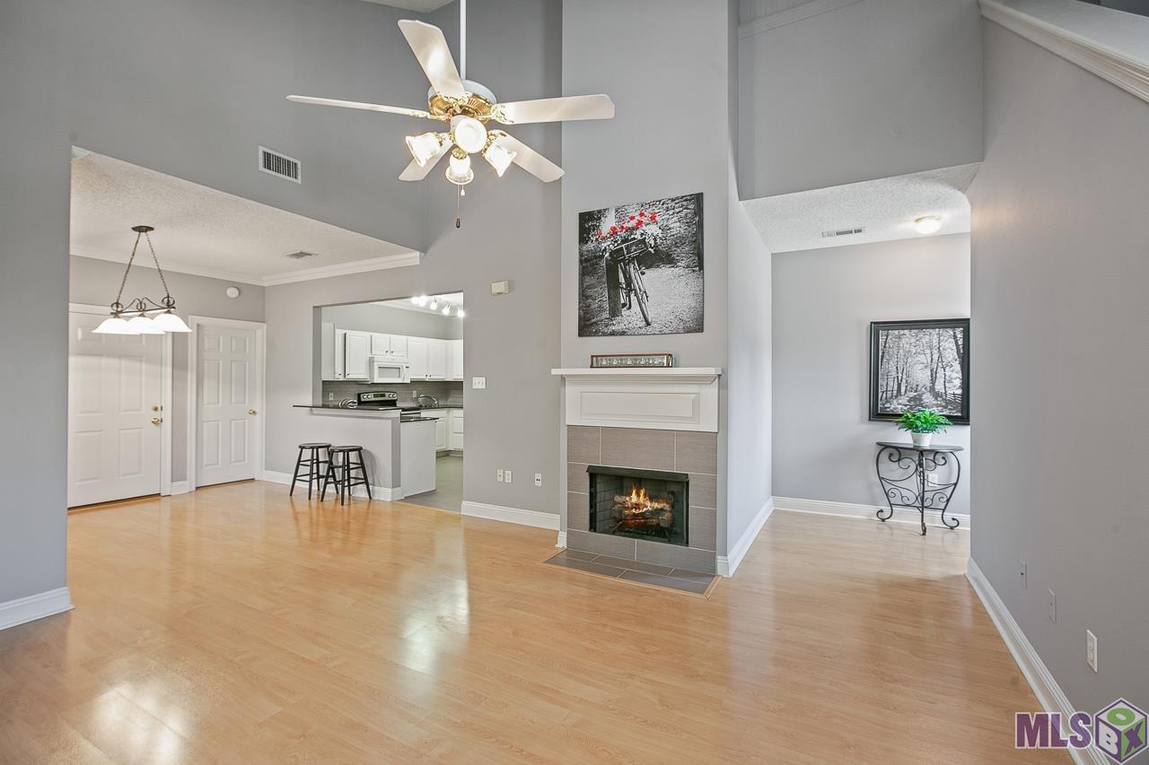 4464 Highland Road, Unit 807 Baton Rouge, LA 70808 - Photo 4 of 25 Large Den with Updated Fireplace Surround