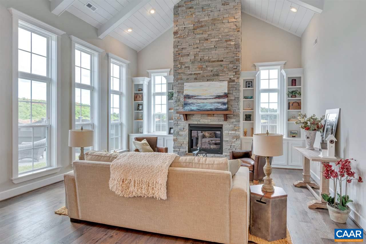 30 Portelet Road Crozet, VA 22932 - Photo 14 of 25 a living room with furniture large window and wooden floor