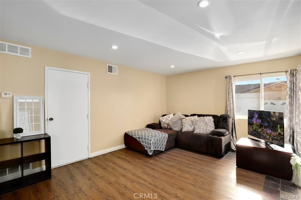 31909 Del Cielo, Unit 11 Bonsall, CA 92003 - Photo 12 of 16 a living room with furniture and a window