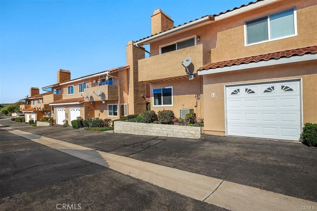 31909 Del Cielo, Unit 11 Bonsall, CA 92003 - Photo 16 of 16 a view of a house with a street