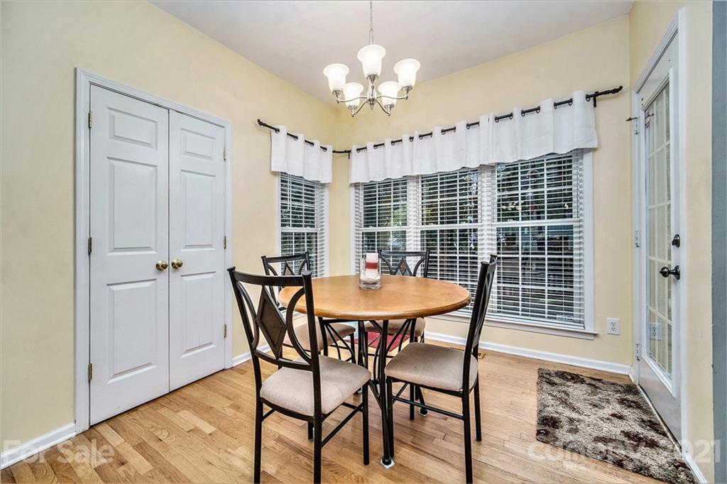 17005 Hampton Trace Road Huntersville, NC 28078 - Photo 12 of 40 a dining room with furniture and window