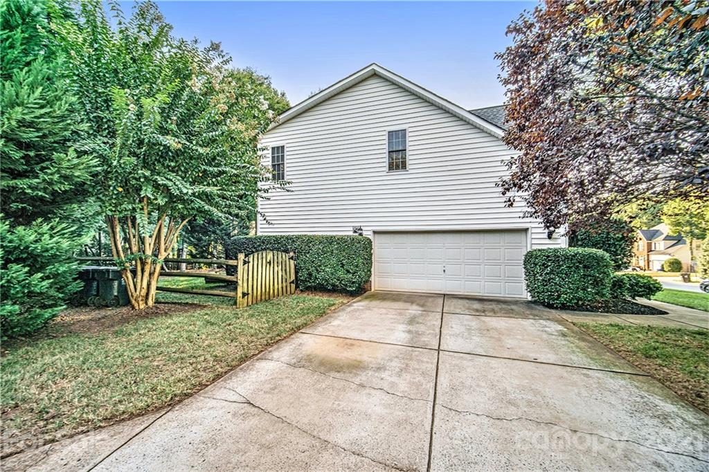 17005 Hampton Trace Road Huntersville, NC 28078 - Photo 32 of 40 a view of a house with a yard and plants