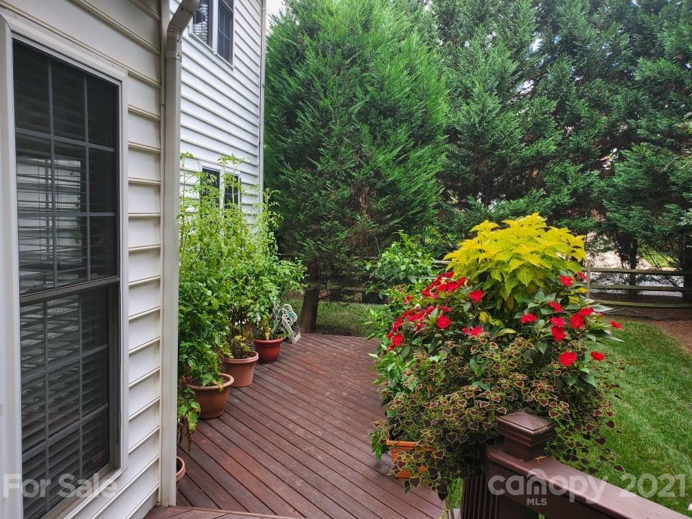 17005 Hampton Trace Road Huntersville, NC 28078 - Photo 38 of 40 a view of flower garden with wooden fence