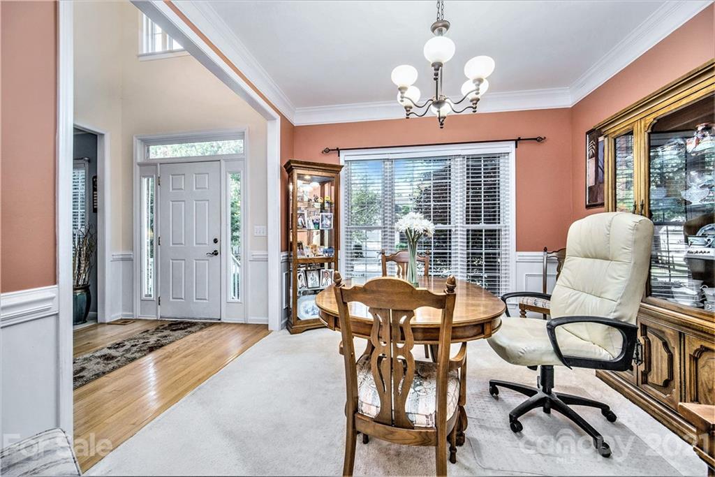 17005 Hampton Trace Road Huntersville, NC 28078 - Photo 6 of 40 a view of a dining room with furniture window and outside view