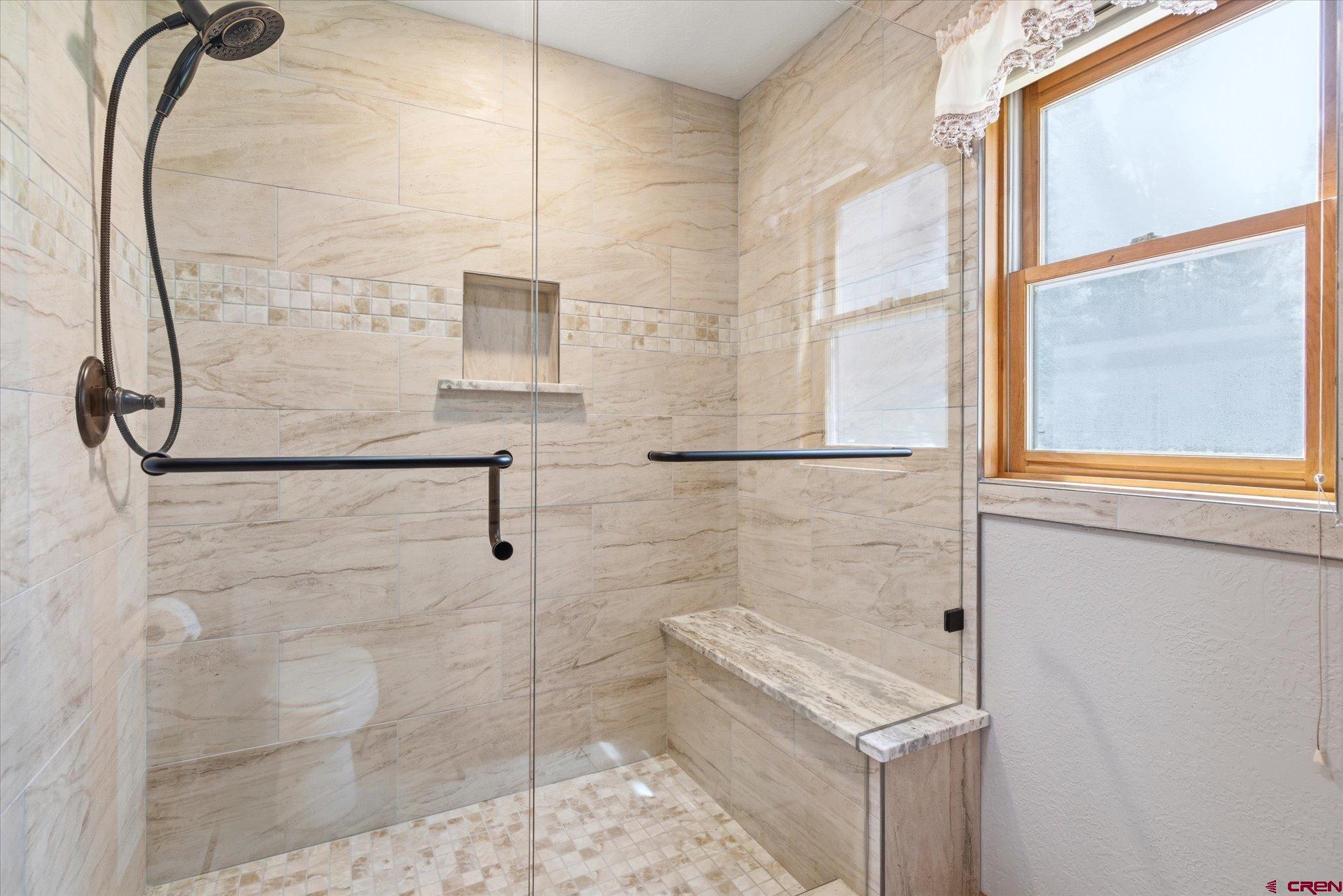 197 Hummingbird Way Bayfield, CO 81122 - Photo 18 of 44 a bathroom with a shower