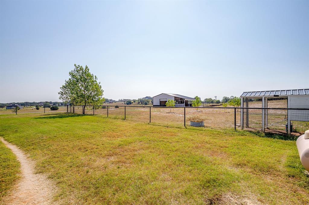 116 Aviara Ridge Road Poolville, TX 76487 - Photo 30 of 38 a view of a yard with an outdoor space