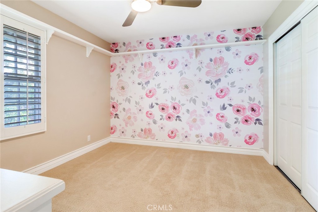 7770 Broadacre Place Riverside, CA 92504 - Photo 24 of 42 a view of a refrigerator with a white cabinet