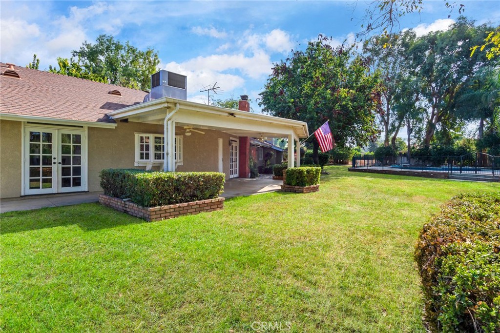 7770 Broadacre Place Riverside, CA 92504 - Photo 29 of 42 front view of a house with a big yard