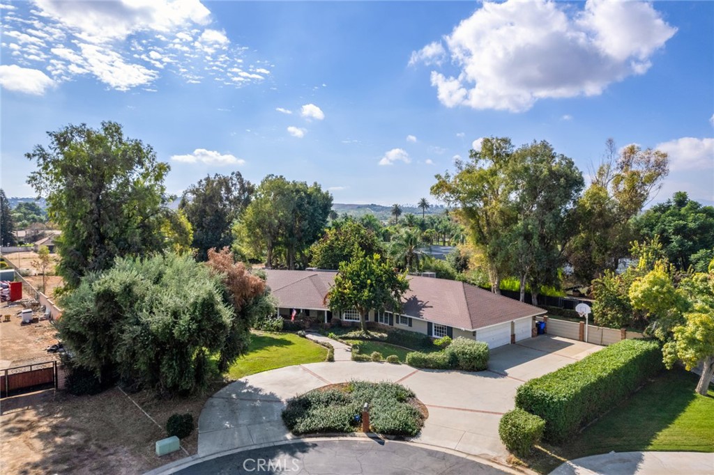 7770 Broadacre Place Riverside, CA 92504 - Photo 36 of 42 a view of a house with swimming pool and furniture