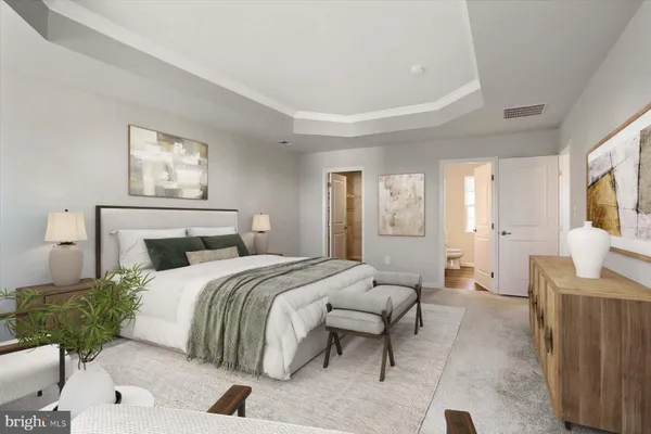 a bedroom with a balcony a bed and a couch