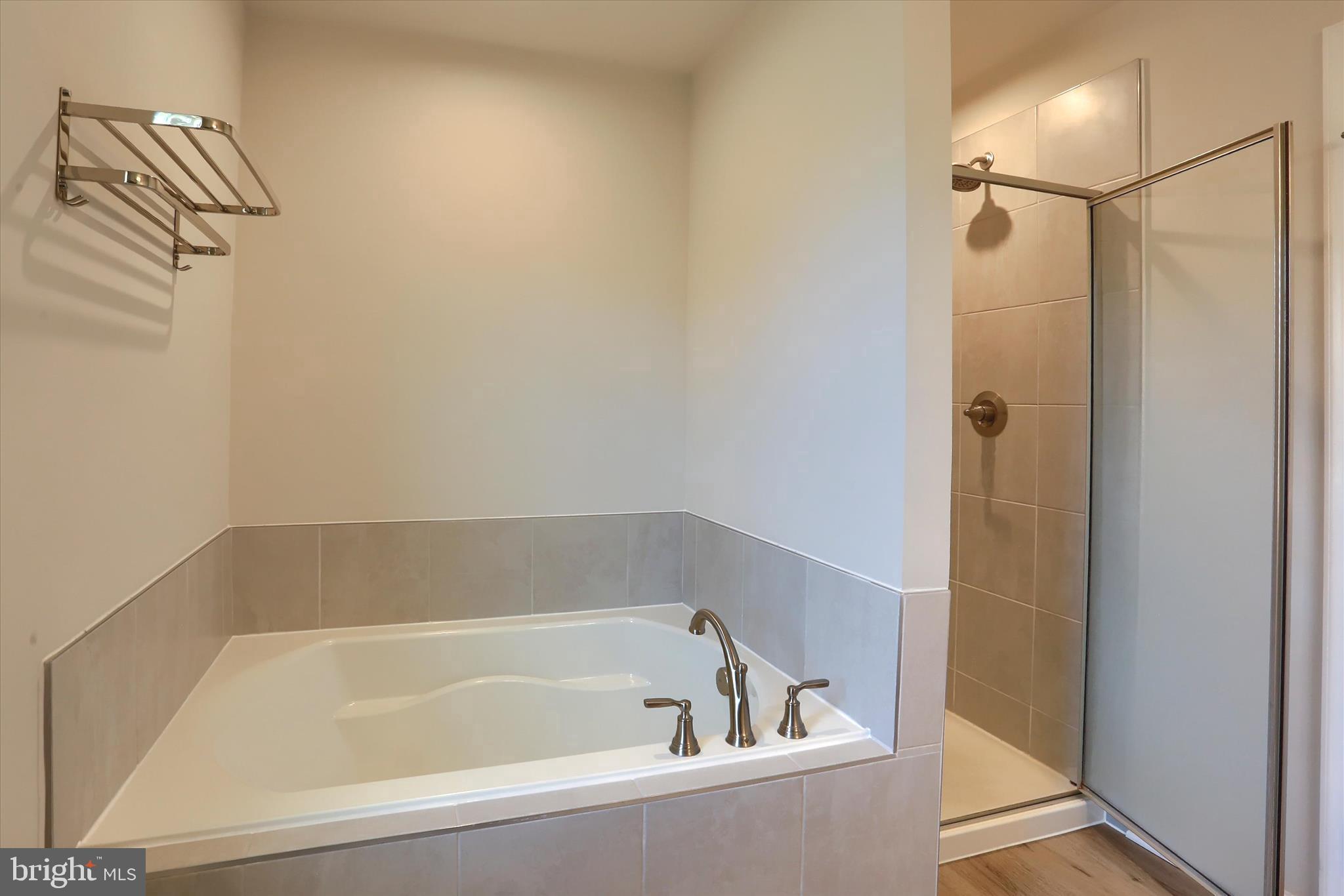 562 Monocacy Trail Spring Grove, PA 17362 - Photo 38 of 67 a white bath tub sitting next to a shower