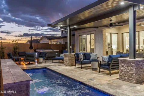 a living room with lots of furniture and a dining table