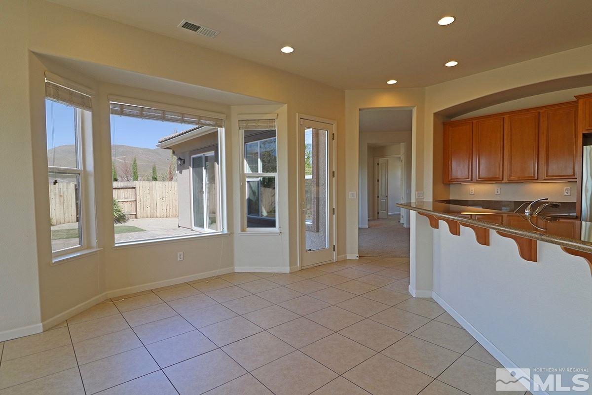 2835 Bull Rider Drive Reno, NV 89521 - Photo 4 of 25 a view of kitchen with windows and refrigerator