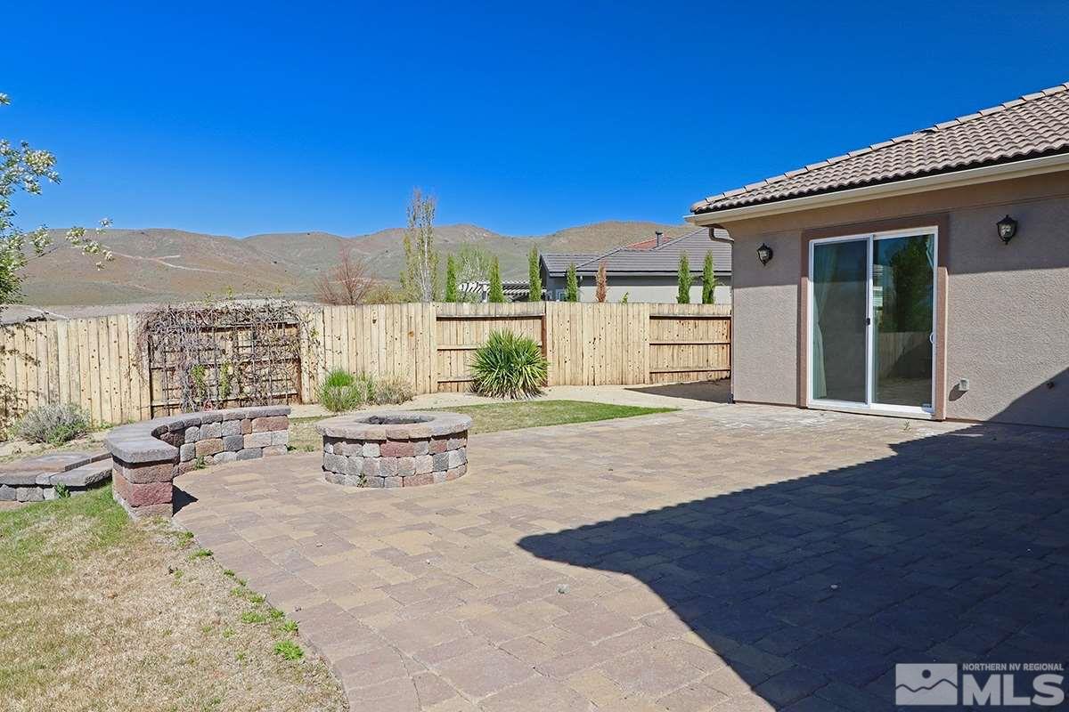 2835 Bull Rider Drive Reno, NV 89521 - Photo 8 of 25 a view of swimming pool with outdoor seating and plants