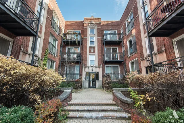 a front view of a multi story residential apartment building